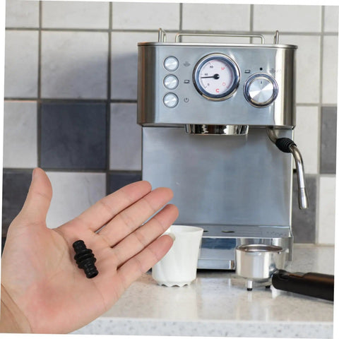 Hand holding Steam Wand Insulation Sleeve And Rubber Cover For Coffee Makers, Replacement Shield For Steam Nozzle.