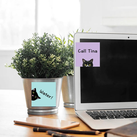 Nine Pad Cat Themed Sticky Notes Set In Pink With Super Adhesive Self Stick Notes on plant pot and laptop screen, 3x3 inch pads
