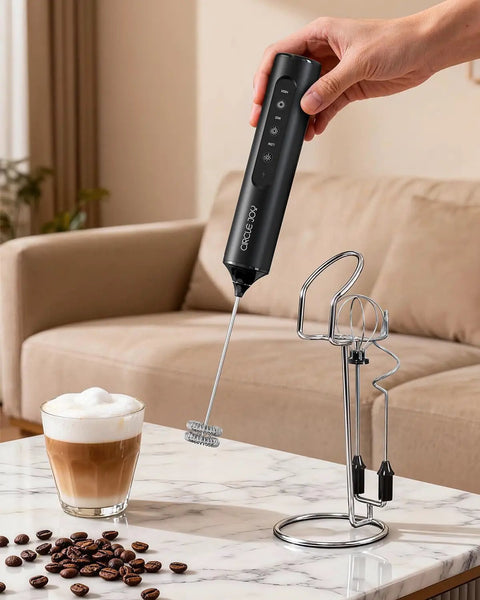 Dope Rechargeable Handheld Milk Frother Wand With Stand, 3 Speed Settings, 3 Stainless Steel Whisks, Storage Box, Black on table