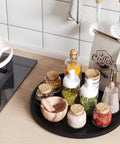 Real Deal Bamboo Lazy Susan Organizer For Kitchen Cabinet Super Slick Rotating Swivel Tray with spices and jars on black turntable