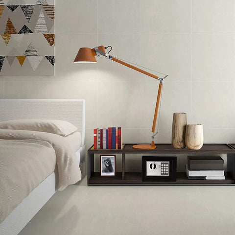 Modern bedroom with a wooden lamp, books, and decor on a shelf, displaying a 4.6L Digital Steel Safe With Electronic Lock For Home Or Office.