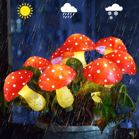 8 Pack Red Mushroom Solar Lights for Outdoor Garden Decor with 8 Lighting Modes, festive glow during rain in a garden setting.