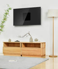 Super Slick Vesa Mount Adapter Plate For Flat And Curved TV Universal Conversion Bracket mounted on a stylish wall above a wooden cabinet.