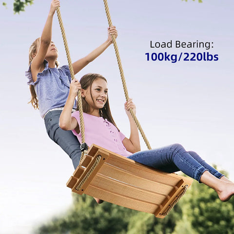 Two kids smiling on a Beech Wood Tree Swing Seat With Adjustable Rope For Kids, outdoors, swing supports 220 lbs.