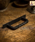 Premium Solid Heavy Duty Rustic Twisted Barn Door Handles In Black Wrought Iron Six Inch Farmhouse Cabinet Pulls on wooden surface