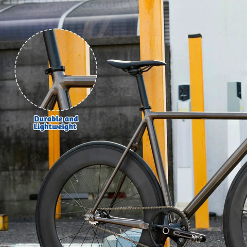 Universal 31.8mm Bike Seat Post Clamp Quick Release Aluminum on a bike seat showing secure grip and tool-free adjustment.