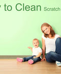 Woman and child sitting on floor with Moisture Resistant Vinyl Baseboard Molding With Wood Grain Finish Quarter Inch Thick Four Inch Tall Rubber Wall Base Trim Waterproof Base Molding For Bathrooms Basements Garages Sixteen Foot Length Easy Install against a green wall. Text reads 'Easy to Clean Scratch Resistant.'