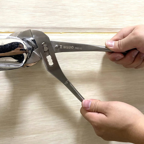 Side view of WEDO stainless steel groove-joint pliers, 12-inch water pump pliers with V-jaw
