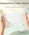 Hands holding a thickened pure cotton towel showing its soft, lint-free texture from the 14 Pack Compressed Travel Towel Tablets Ultra Absorbent Water Activated Compact Cloth Dudes Swear By These Fast Expand Wipes For Camping Hiking And Road Trips.