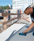 Nail Your Next Home Project Straight Up With This Hella Reliable Wall Scanner And Metal Detector used by a contractor scanning concrete.