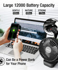 Portable Desk Fan With 12000mAh Battery, LED Lights And USB Charging on desk charging a phone with USB cable, laptop in background