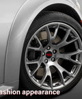 Close-up of car wheel with 4 Pack 63mm Slash Wheel Center Cap Covers Red For Dodge Charger Challenger Durango Journey Dart Avenger Hornet R/T SRT Hub Caps With Valve Stem Caps, Durable Non Fading Rim Trim Replacement
