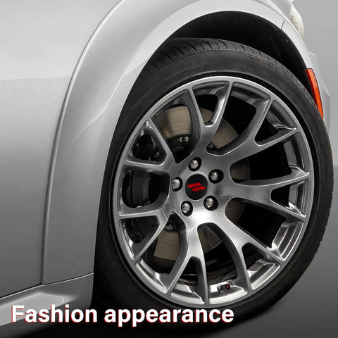 Close-up of car wheel with 4 Pack 63mm Slash Wheel Center Cap Covers Red For Dodge Charger Challenger Durango Journey Dart Avenger Hornet R/T SRT Hub Caps With Valve Stem Caps, Durable Non Fading Rim Trim Replacement