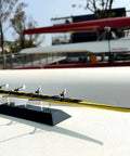 Little Yellow Dope 1To50 Scale Rowing Shell Model Alloy Collectible with zinc hull on a display stand, office decor.