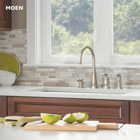 Edison One-Handle High Arc Kitchen Faucet With Side Sprayer And Soap Dispenser, 4-Hole Mount in a modern kitchen setup