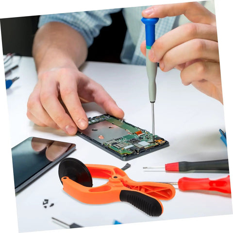 Person using tools on a phone motherboard beside a Phone Screen Opening Tool With Suction Cup Pliers For Easy DIY Repairs.
