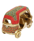 Sick Red Brass Auto Rickshaw Replica With Stone Studded Details Classic Indian Tuk Tuk Model Display Piece showing intricate design and vibrant colors.