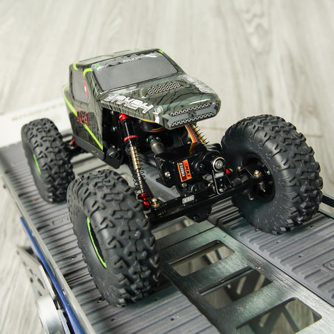 RC crawler on ramp with 51mm Long Travel Shocks For Axial AX24 SCX24 RC Crawler Upgrade Double Barrel Threaded Dampers CNC Machined Aluminum Bodies.