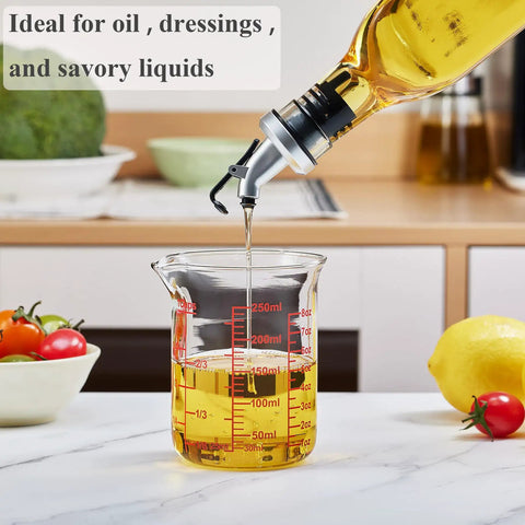 Borosilicate Glass Measuring Cup 1 Cup 8oz with Spout pouring oil in kitchen setting