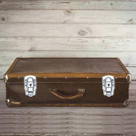 4 Pack Silver Iron Toolbox Lock Buckles With Key Heavy Duty Draw Latch on a brown tool box for secure gear storage
