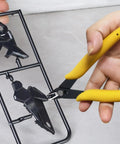Pro Grade 20Pcs Gunpla Model Tools Kit for easy assembly showing yellow-handled pliers cutting plastic model parts