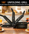 Stainless Steel 1000W Panini Press Grill And Sandwich Maker With Non Stick Plates Removable Drip Tray 3 In 1 Electric Contact Grill Opens 180 Degrees Flat for cooking burgers and sandwiches.