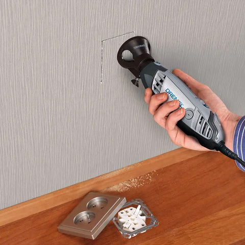 Total Game Changer Multipurpose Cutting Kit Featuring Quick Depth Control used for cutting drywall for outlet installation.