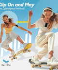 Women skateboarding wearing Clip On 64GB MP3 Player With Bluetooth 5.3 FM Radio And Voice Recorder Up To 128GB With Micro SD.