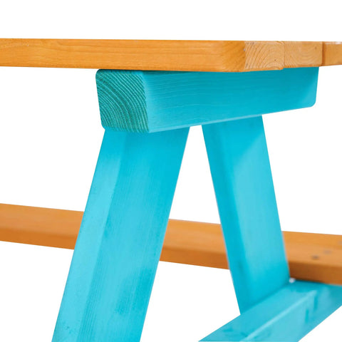 Close-up of Wooden Outdoor Kids Picnic Table And Bench Set in Brown And Aqua, showing durable wooden bench leg and table corner.