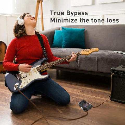 Guitarist using Riffer High Gain Distortion Guitar Pedal with True Bypass in living room for brutal metal tones.