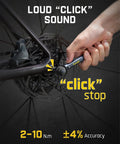 Hand using Mini Click Torque Wrench Set For Bikes With 1/4 Inch Drive, 2-10 Nm Range on bicycle disc brake.