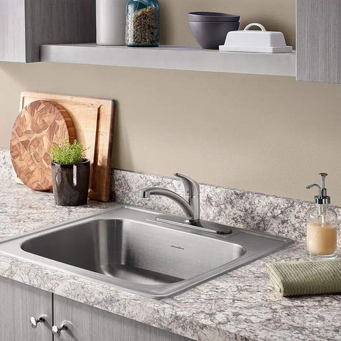 Colony Pro Single-Handle Kitchen Faucet With Deck Plate In Stainless Steel, in modern kitchen setting, with ceramic disc valves.