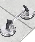 Heavy Duty Glass Suction Cup With Stainless Steel Handle For Lifting Heavy Tiles Smooth Panels And Glass attached to tile surface.