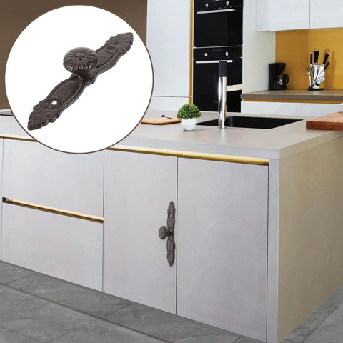 Vintage Cast Iron Drawer Pulls, Rustic Iron Cabinet Handles for Dresser and Wardrobe displayed on modern kitchen cupboard.