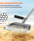 Long Handle Sand Scoop With Shovel For Metal Detecting At The Beach Heavy Duty Stainless Steel Beach Digging Tool With Fast Sifting Treasure Finds Scoop For Metal Detectors Durable Rust Proof Digging Shovel with hexagonal mesh holes on sandy beach.