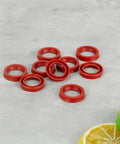 10 Pieces Silicone O Rings For Coffee Makers And Espresso Machines Seals Replacement Gaskets, 2.25x2.25x0.45 cm, red on table.
