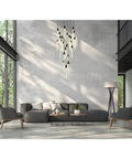 Super Sleek Modern Crystal Pendant Ceiling Light With Twenty Five Bulbs Polished Black Metal Trim in modern living room setting.