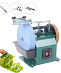Tough As Nails 110V Water Cooled Grinder With 10 Inch Sharpening Stone sharpening kitchen knife beside sliced green pepper.