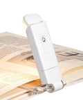 USB Rechargeable Book Reading Light With 3000K Warm White, No Fuss Brightness Adjustable Clip On LED Bookmark Lamp clipped to book