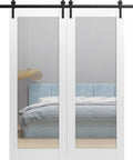 Double Barn Door Set 64x84 Inches Clear Glass, White Silk Finish, Top Mount 13 Ft Rail System in bedroom setting