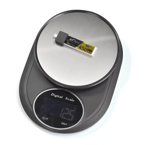 4 Pack 450mAh 1S 3.8V LiHV 95C LiPo Batteries with BT 2.0 Connector on digital scale showing weight in grams