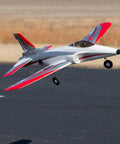 Habu STS 70mm EDF Jet RC Airplane Ready To Fly With SAFE Technology Smart Trainer taking off, red and gray design.