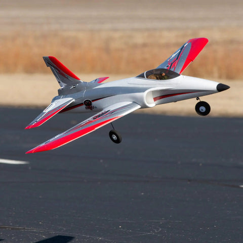 Habu STS 70mm EDF Jet RC Airplane Ready To Fly With SAFE Technology Smart Trainer taking off, red and gray design.