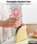 Person placing 3 In 1 Portable Personal Fan With 4000mAh Battery And LED Display into yellow pouch, showing fan's compact size