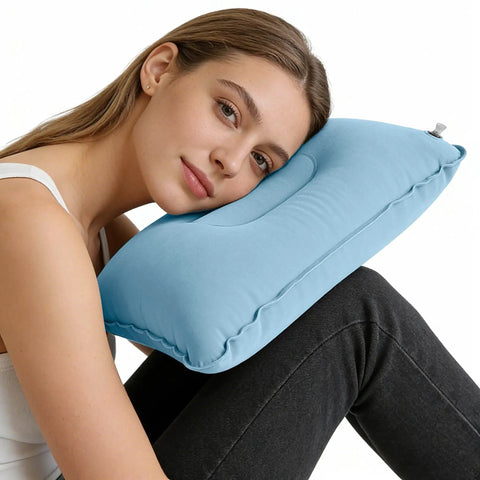 Woman using Inflatable Travel Pillow With Adjustable Firmness For Custom Neck Support And Easy Deflation, A Go To Portable Air Pillow For Camping, Hiking, Road Trips, Office Naps Or Long Flights, Sky Blue Comfort That Packs Small And Feels Great, demonstrating comfort and support.