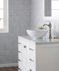 Elavo Round Vessel White Porcelain Ceramic Bathroom Sink 16 Inch for Modern Bathrooms on marble countertop near window