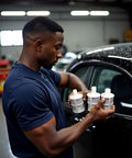 Person holding 10 Pack White 8mm Household Hose Filters For Water Pumps And Sprayers in a garage setting.