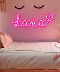 Pink "Lana" LED neon sign on cozy bedroom wall, captures This Must Be The Place LED Neon Sign Large Neon Light atmosphere.