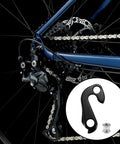 Derailleur Hanger Replacement Part For Trek FX And Dual Sport Bikes Aluminum Alloy shown next to installed bike setup.