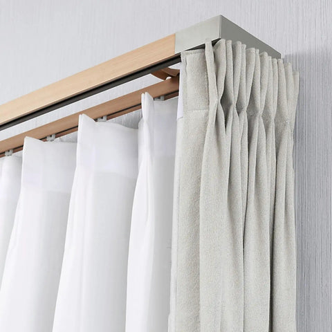 Premium Wall Mounted Sliding Barn Door Track System With 8.86ft Aluminum Alloy Rail And Faux Wood Finish with rolled curtains.